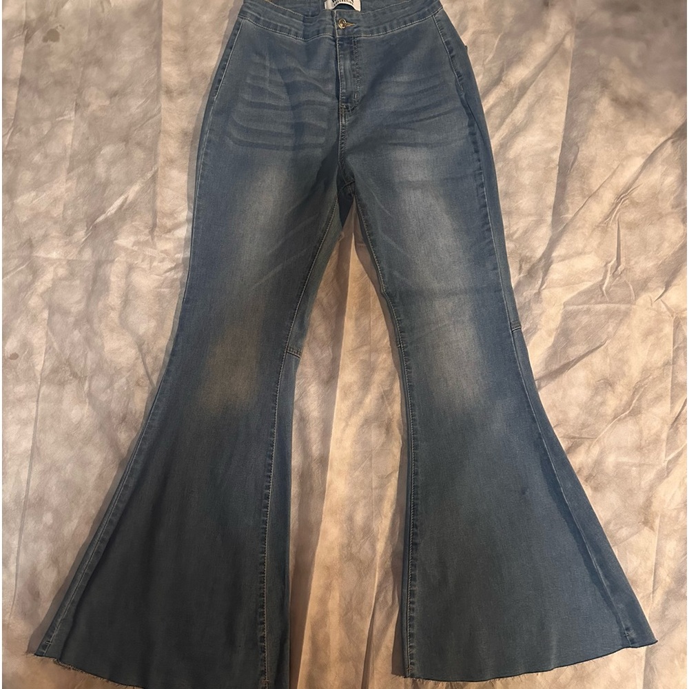 Never worn size 13 Jeans. Flare legs. Waxed Jean Collection.